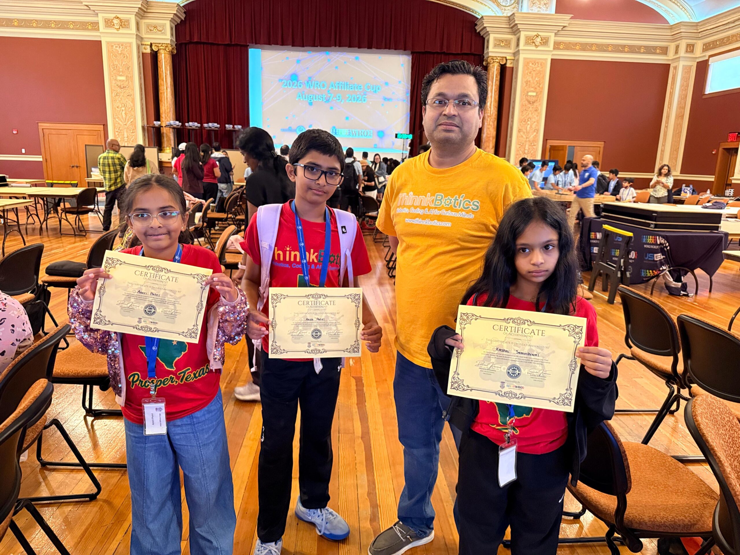Elementary RoboMission team building their robot for the World Robot Olympiad